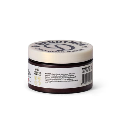 Application of DandyMen styling paste on hair