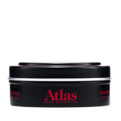 Texture of Atlas clay and pomade hybrid on finger