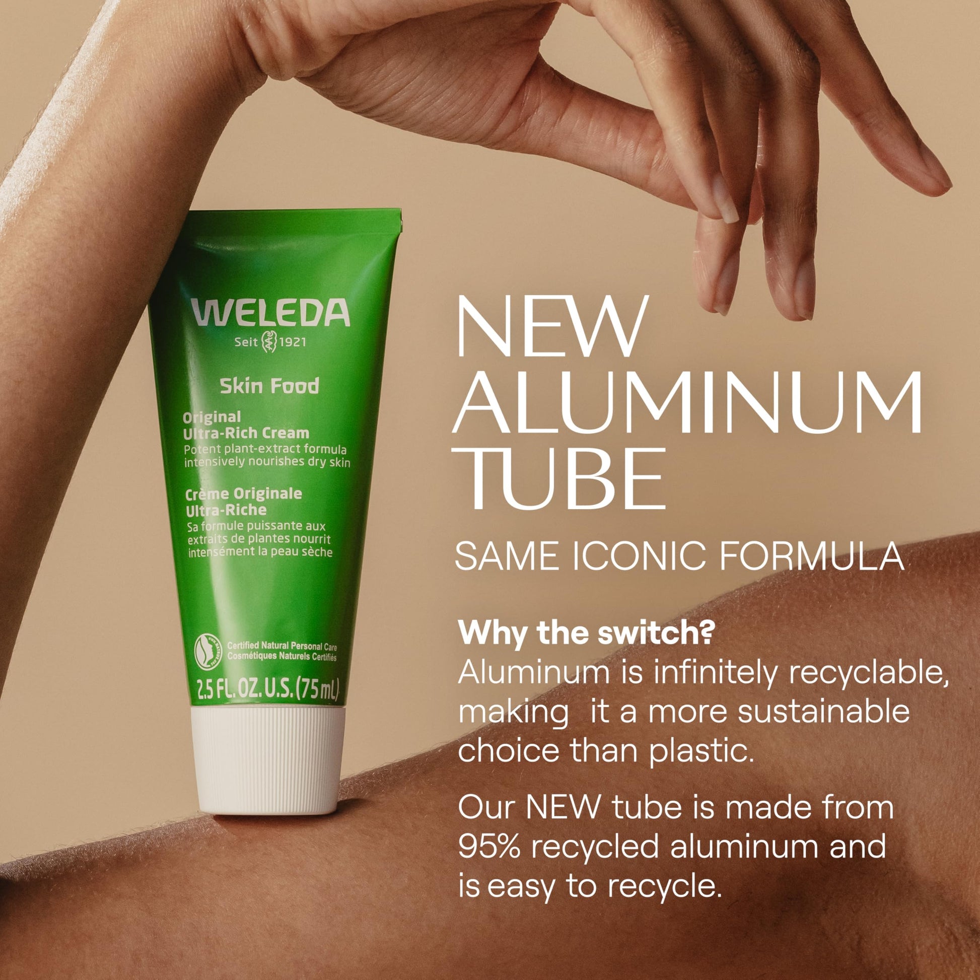 Weleda Skin Food rich botanical body cream being applied to dry hands