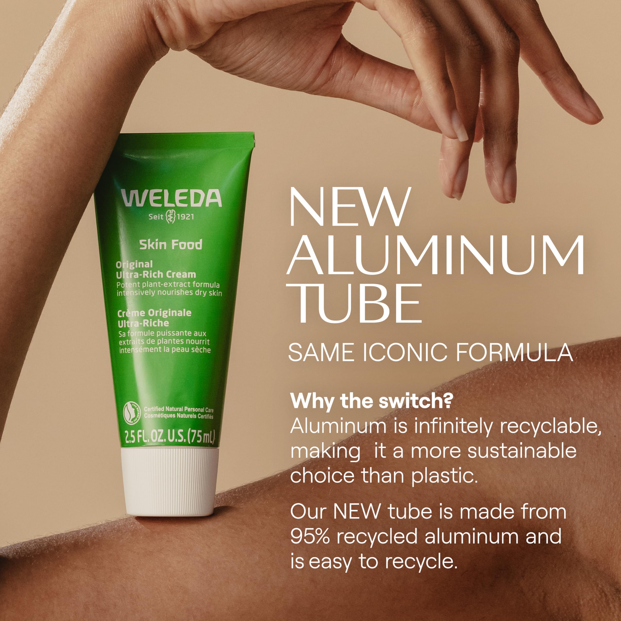 Weleda Skin Food rich botanical body cream being applied to dry hands