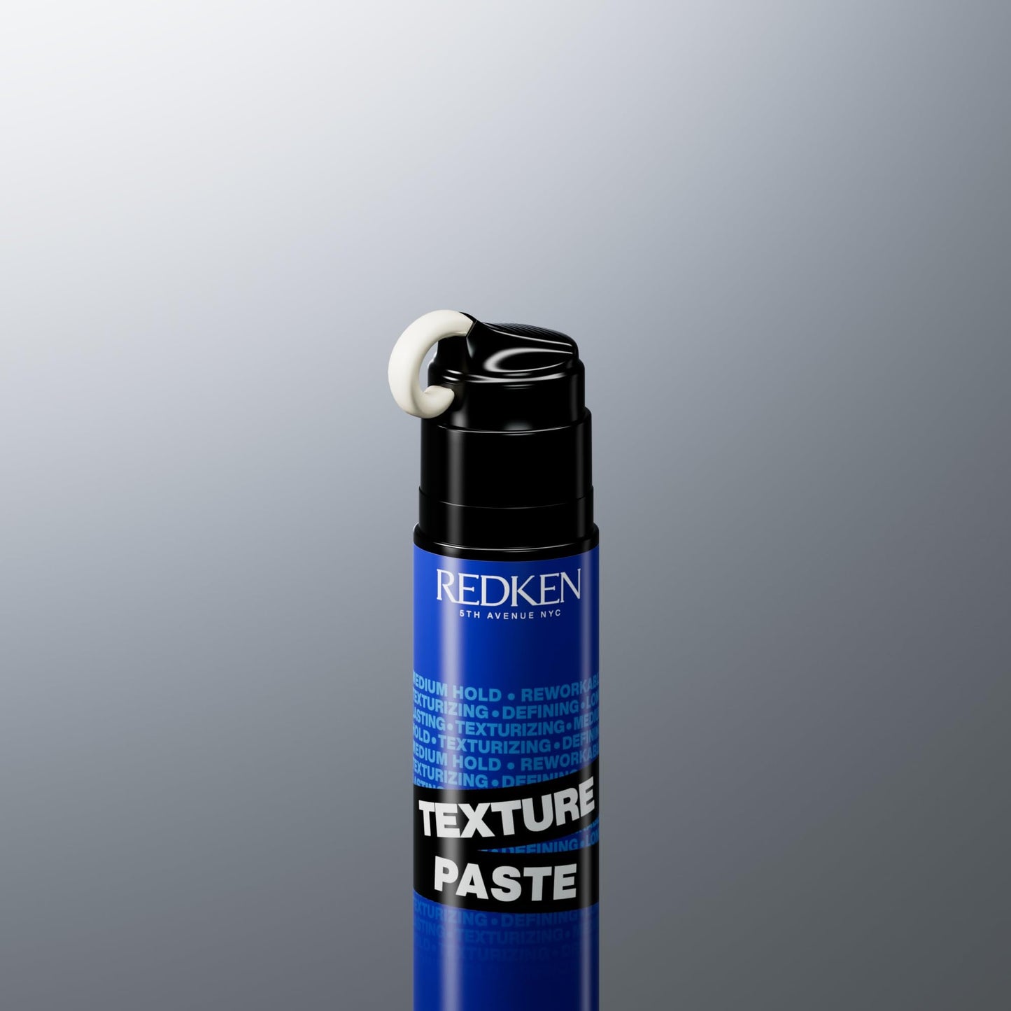 Back view of Redken Long-Lasting Styling Paste bottle