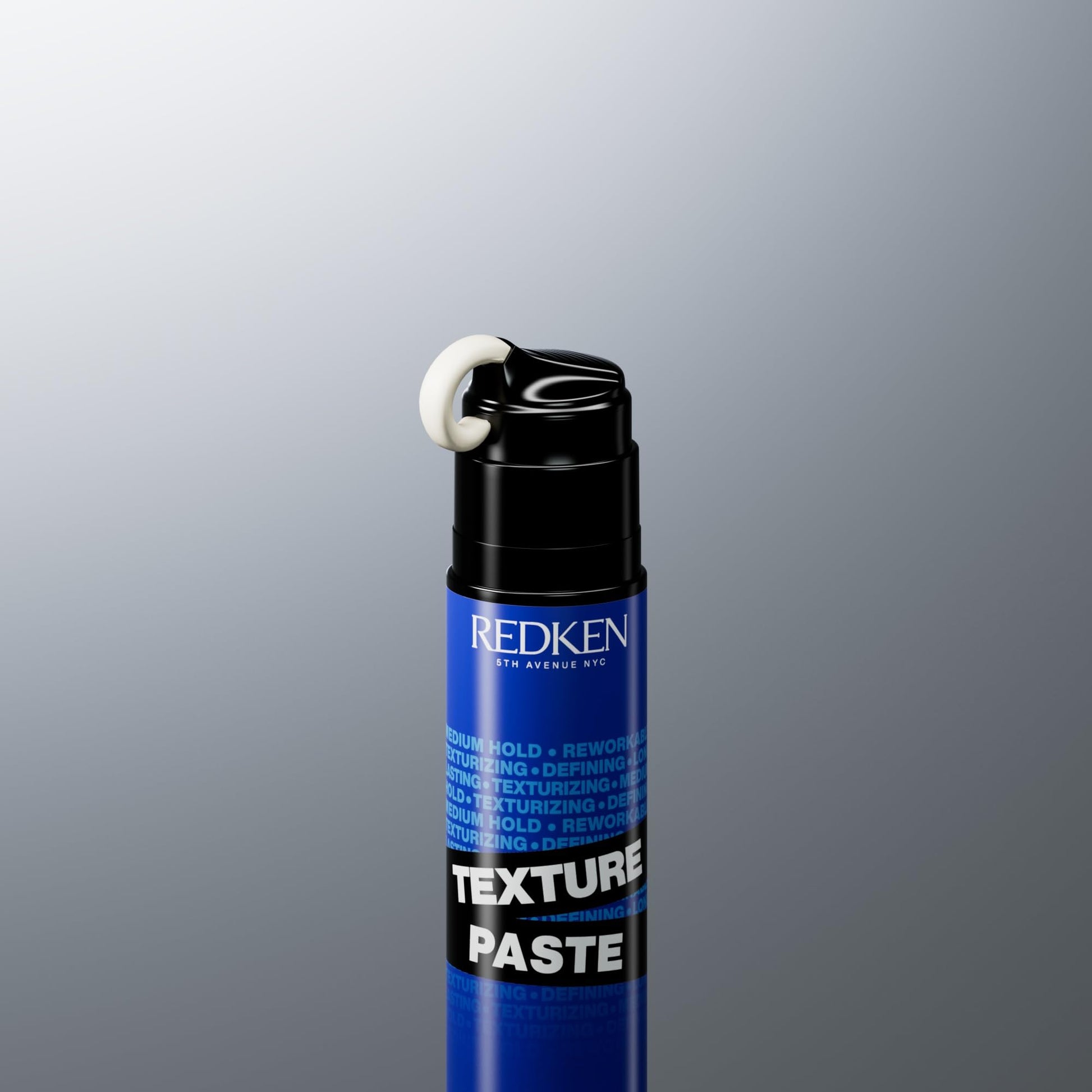 Back view of Redken Long-Lasting Styling Paste bottle