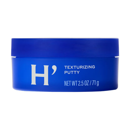 Man styling hair with Harry's texturizing putty
