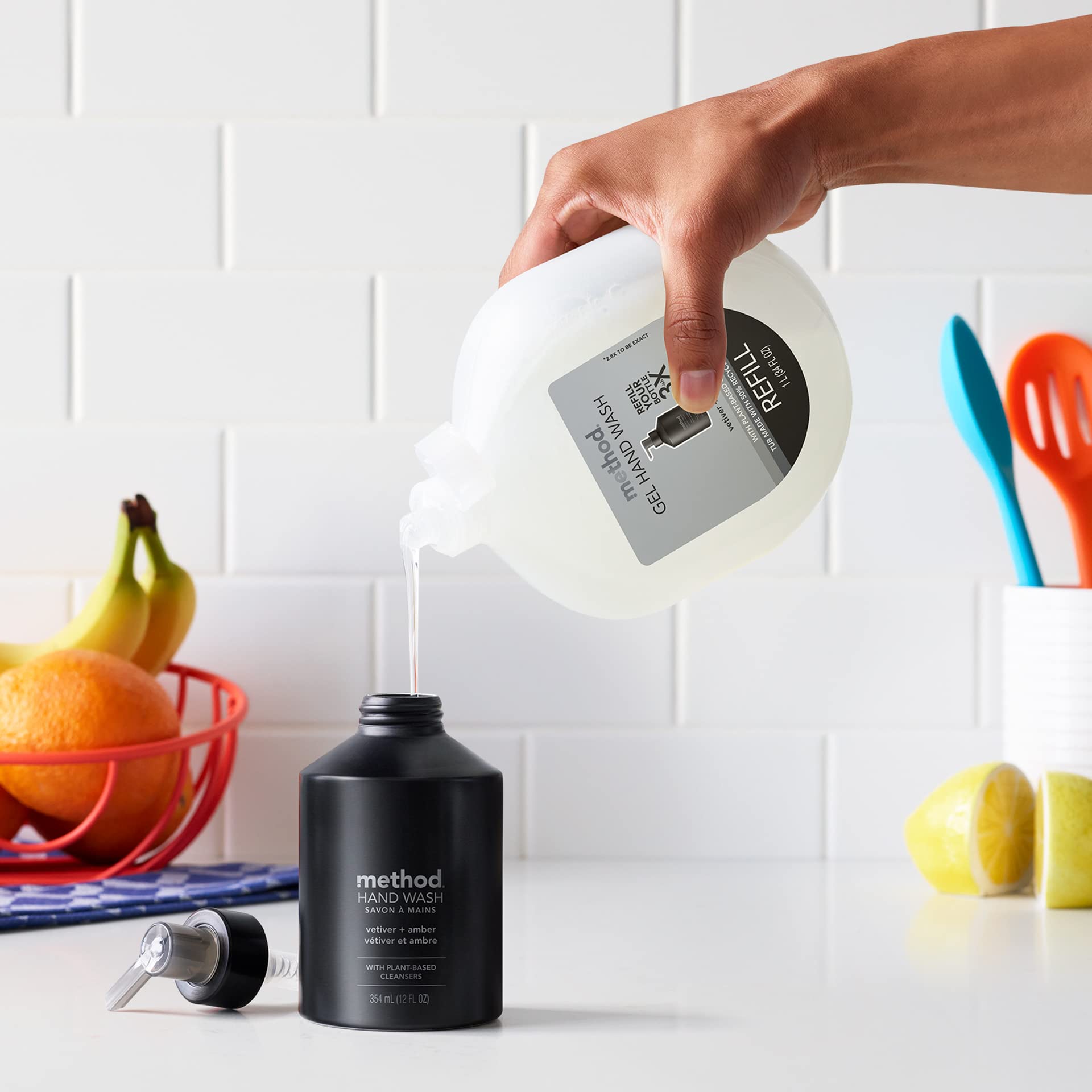 Method Vetiver and Amber soap bottles styled on a bathroom counter