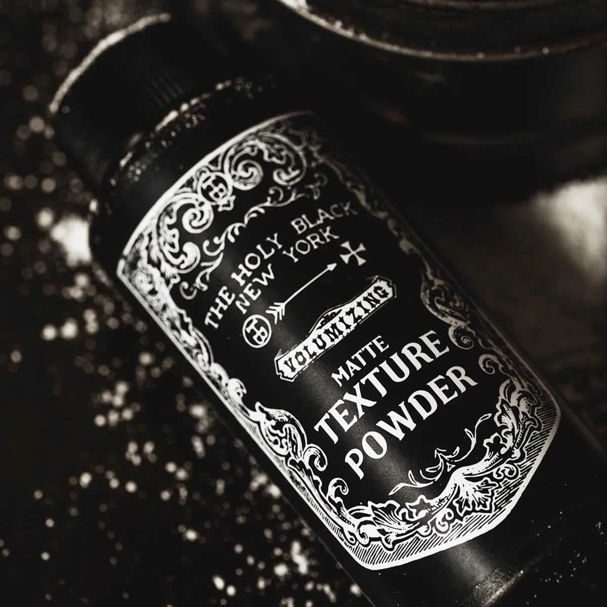 The Holy Black matte texture powder application demonstration.