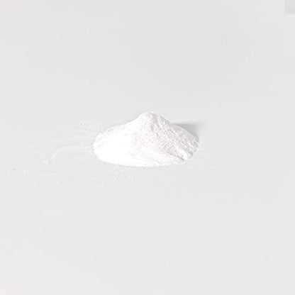 Travel size L3 Level 3 styling powder container in hand