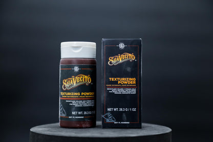 Man styling hair with Suavecito texturizing powder