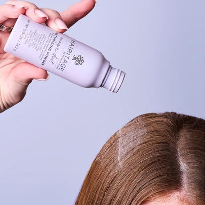 Hairitage hair powder bottle showing volume and texture benefits