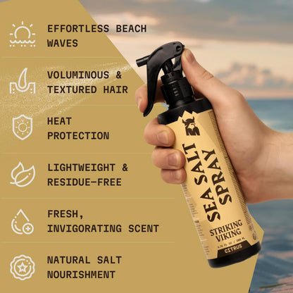Hand holding Striking Viking sea salt spray for hair application demonstration
