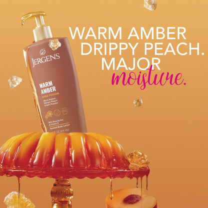 Close up of the pump dispenser on the fourteen fluid ounce Jergens Amber scented lotion bottle.