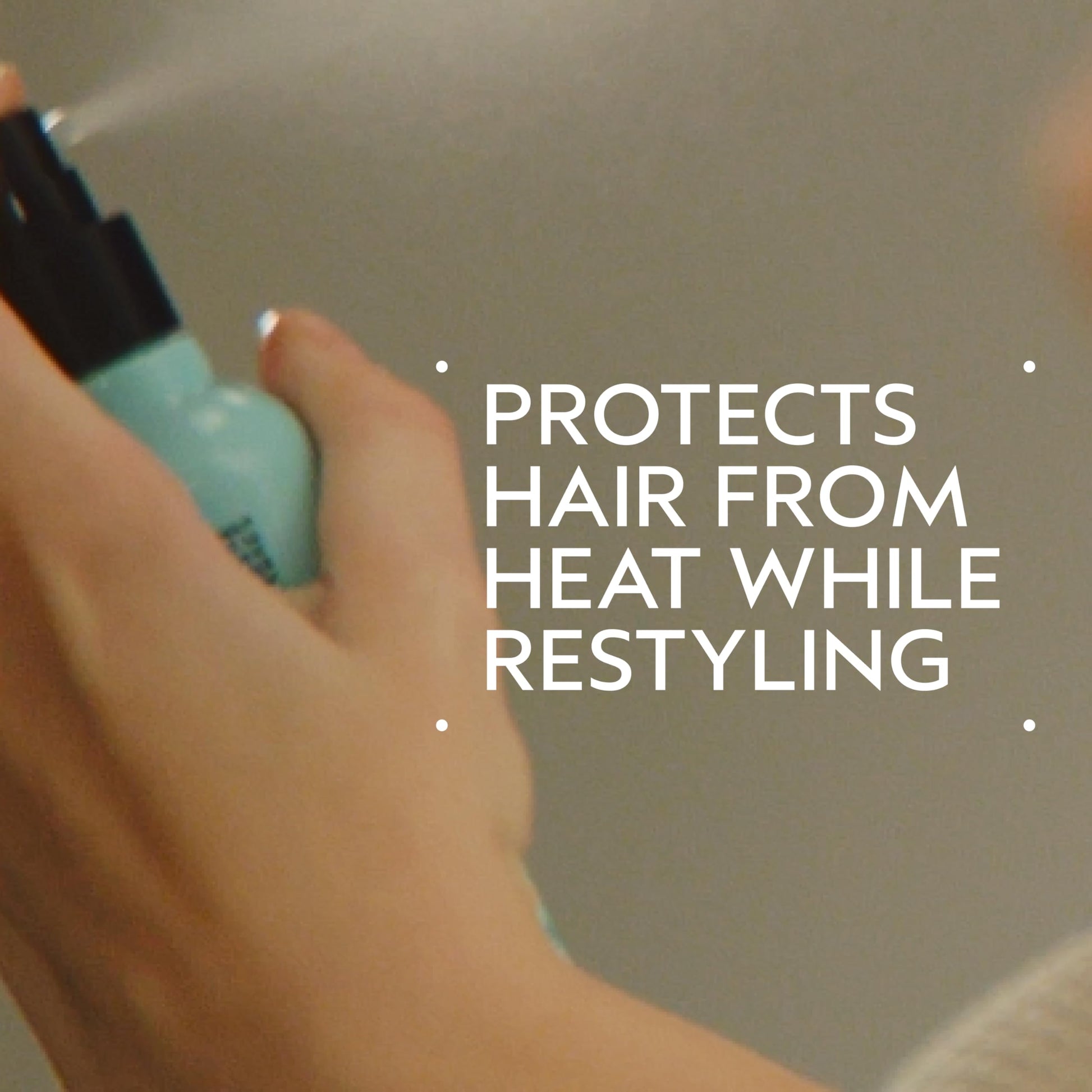 Aveda Heat Relief thermal hair spray bottle showing natural ingredients