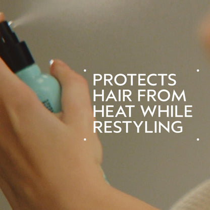 Aveda Heat Relief thermal hair spray bottle showing natural ingredients