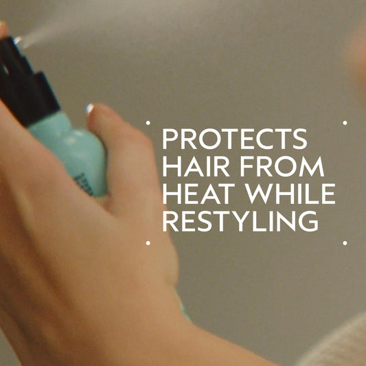 Aveda Heat Relief thermal hair spray bottle showing natural ingredients