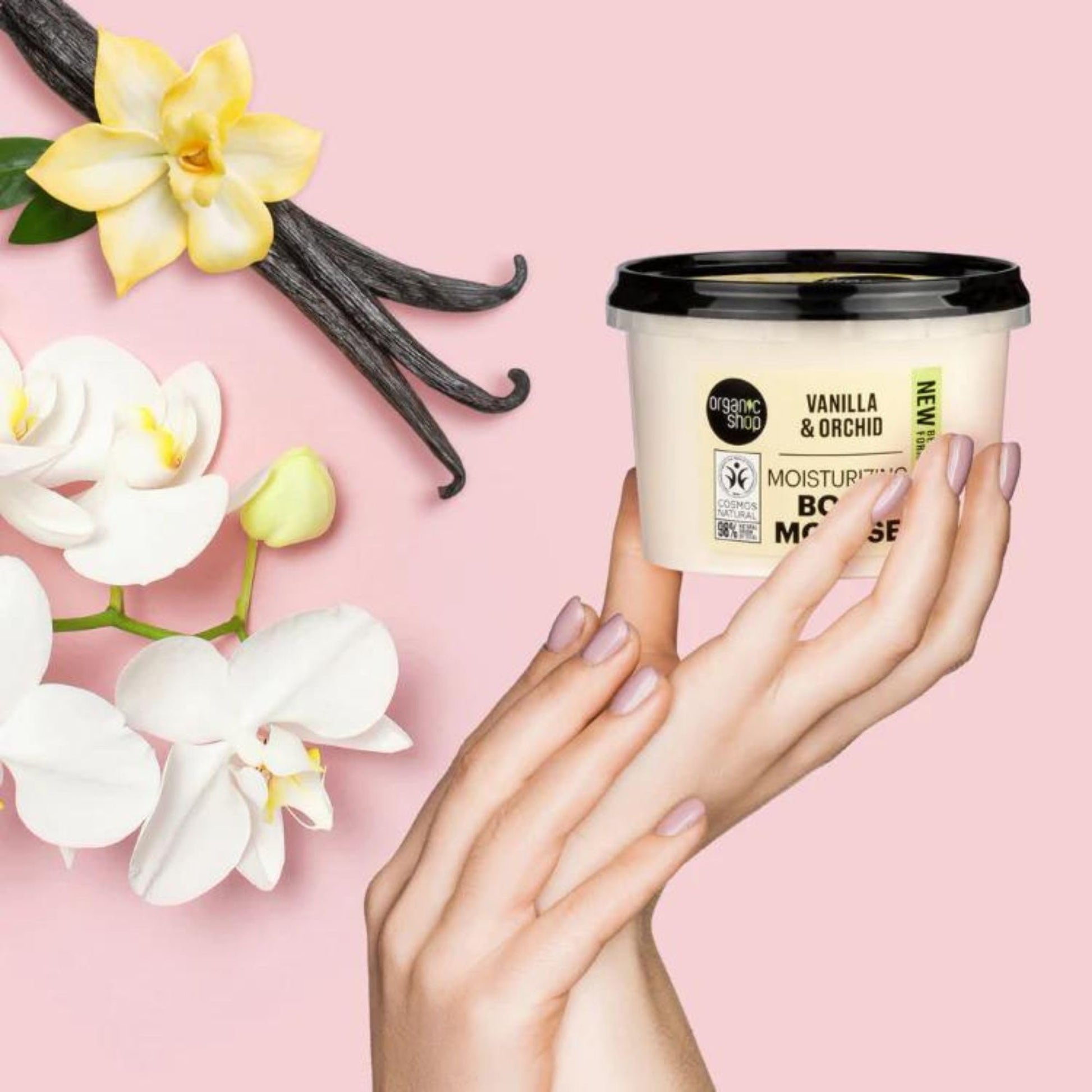 Organic Shop skincare moisturizing body mousse tub next to vanilla pods representation.