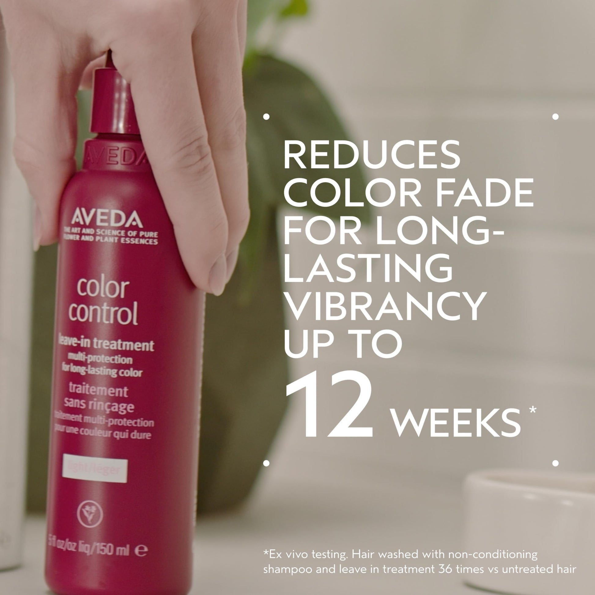 Aveda lightweight color protecting leave in treatment spray nozzle and branding detailing.