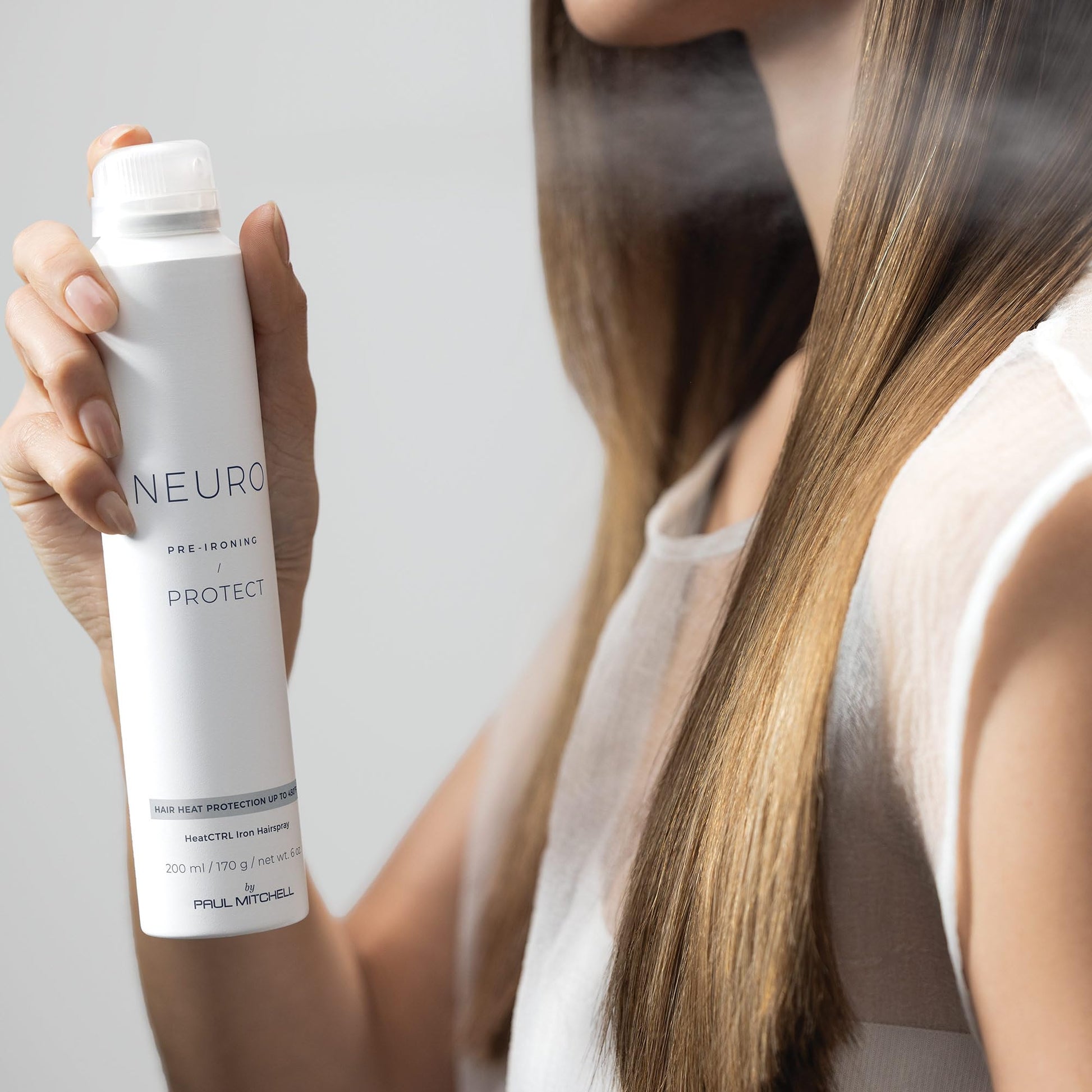 Side profile of 6 fluid ounce Neuro hairspray bottle