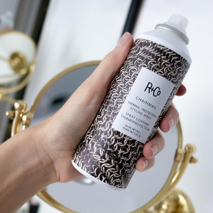 R+Co Chainmail spray bottle showing heat protection benefits