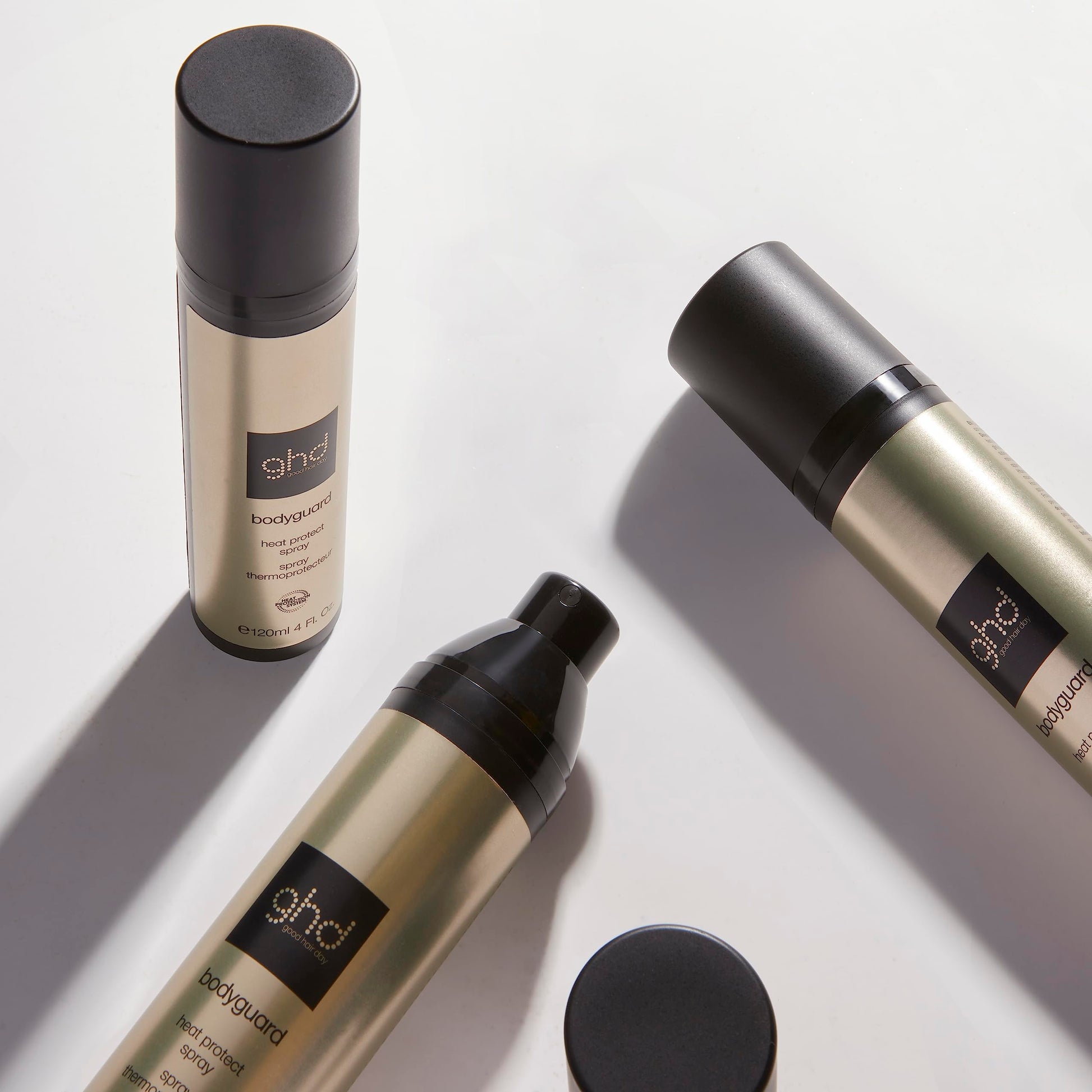 Professional hair styling kit featuring Ghd Bodyguard spray