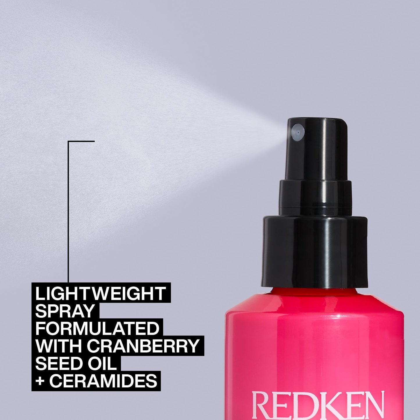Redken hair styling heat protectant spray bottle on white background
