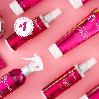 Mielle Organics heat protectant spray for curly hair styling.