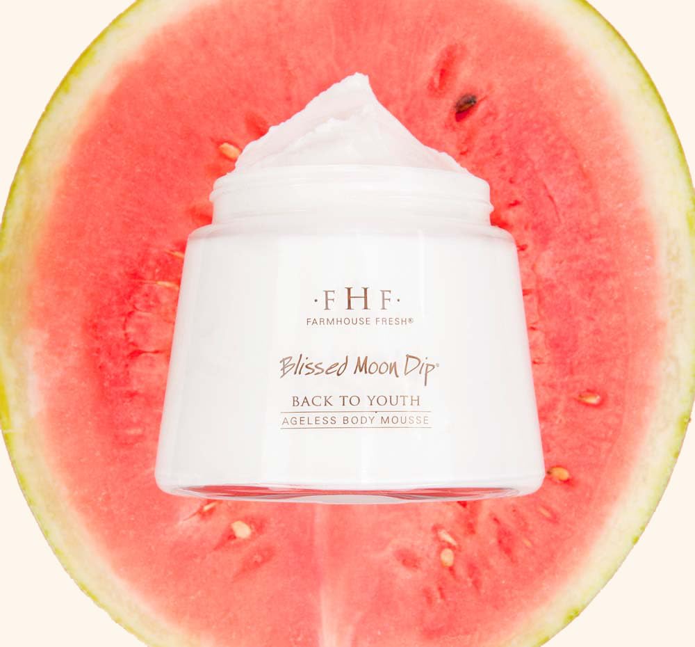 FarmHouse Fresh firming moisturizing peptide cream luxury white glass jar with silver applicator spoon.