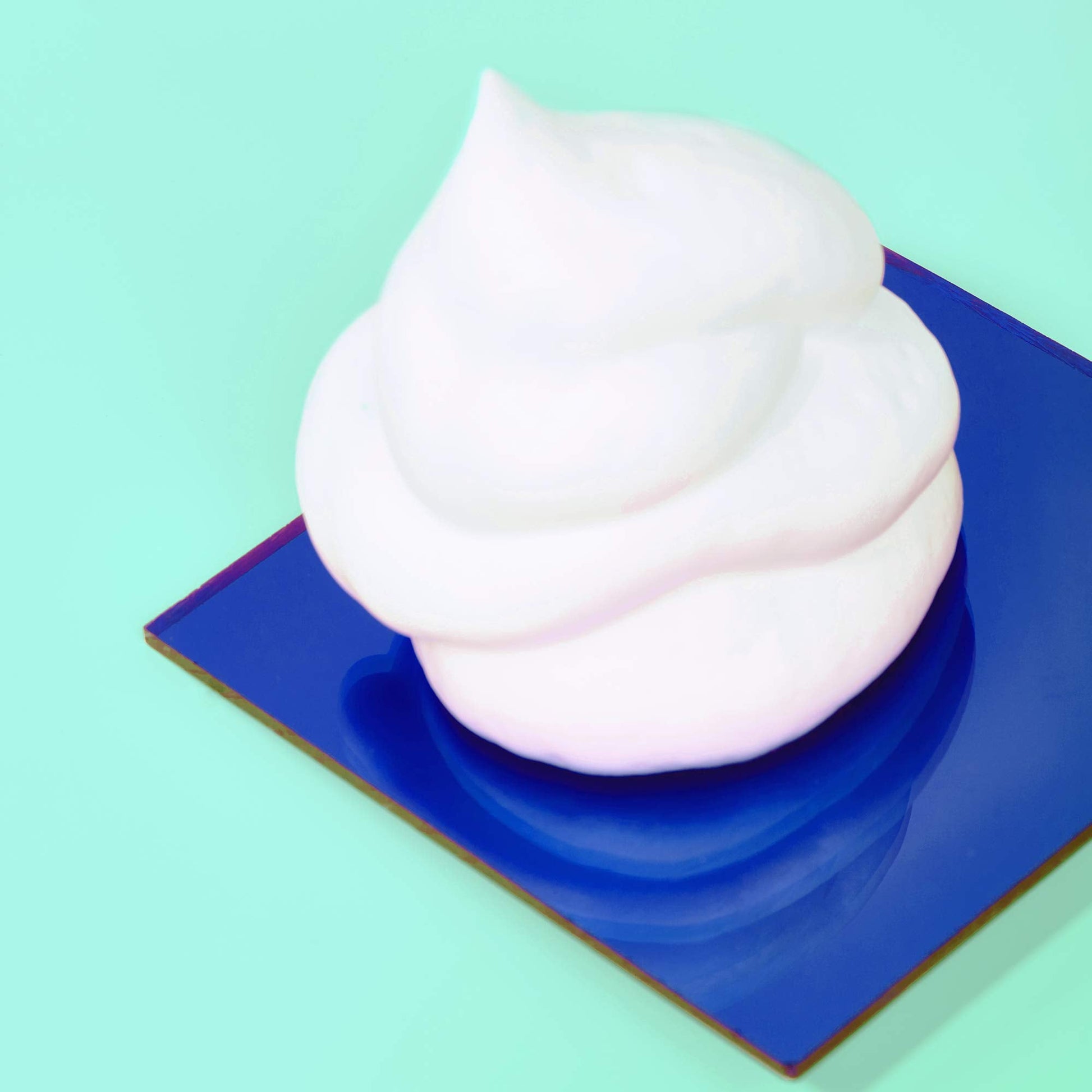Amika plus size styling product displaying one point five ounce volume