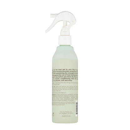 Back of Hairitage heat protectant spray with usage instructions