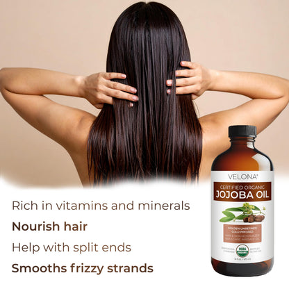 Person applying Velona jojoba oil to hair and skin