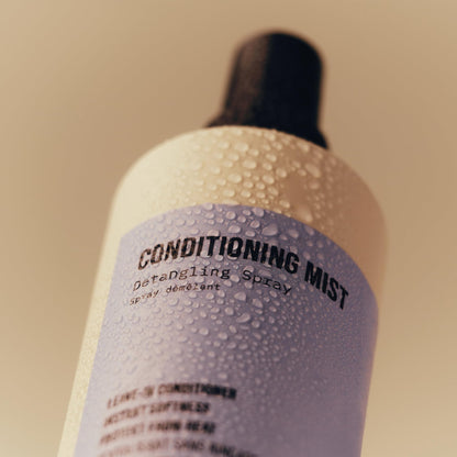 Gentle kids detangling spray for pain free hair brushing and knot clearing.