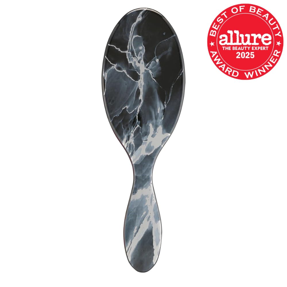 Wet Brush Metallic Marble Onyx hair brush resting on a clean surface.