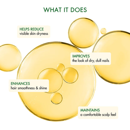 Person applying Majestic Pure jojoba oil to hair and skin