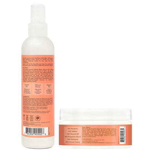 SheaMoisture Coconut and Hibiscus Extra Moisturizing Detangler Spray eight fluid ounce bottle close up.