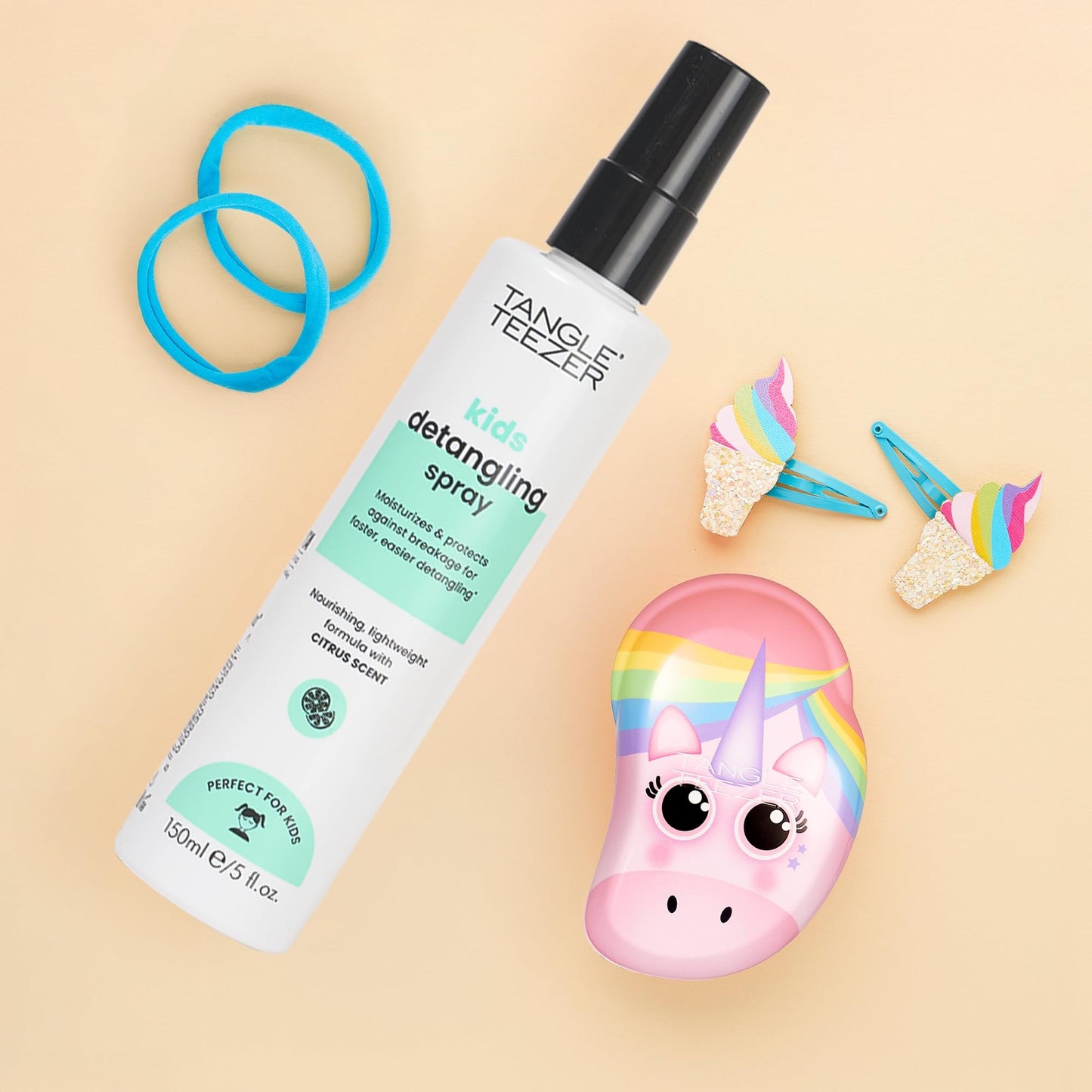 PETA certified cruelty free kids leave in detangling spray bottle graphic close up