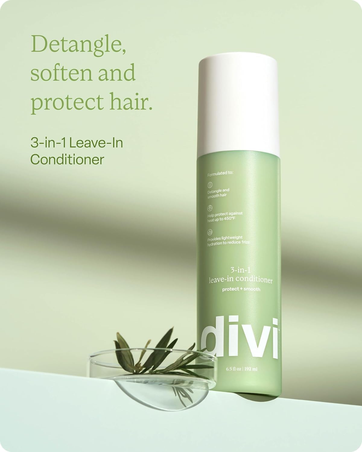 Divi 3-in-1 Leave-In Conditioner 6.5 fluid ounce bottle showing the application nozzle.