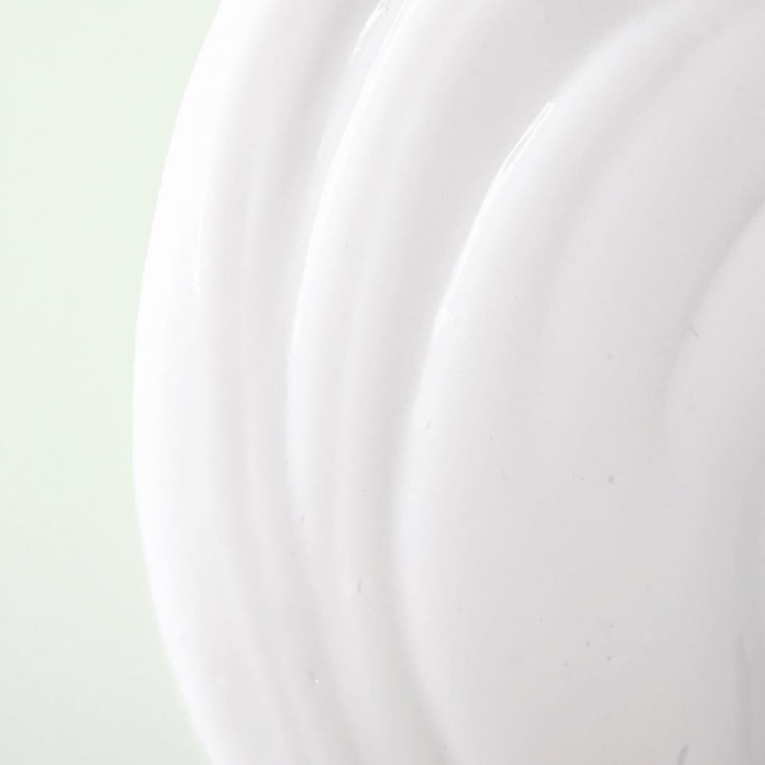 Premium imported packaging of Divi hair care moisturizer bottle.