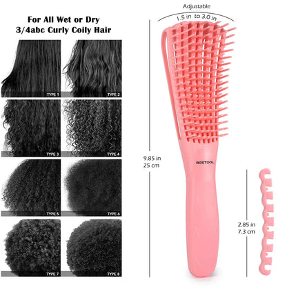 BESTOOL detangling brush with the control bar inserted to adjust bristle firmness for coily hair.