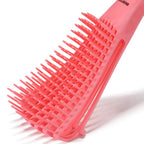 Close up of flexible comb arms on BESTOOL pink hair brush