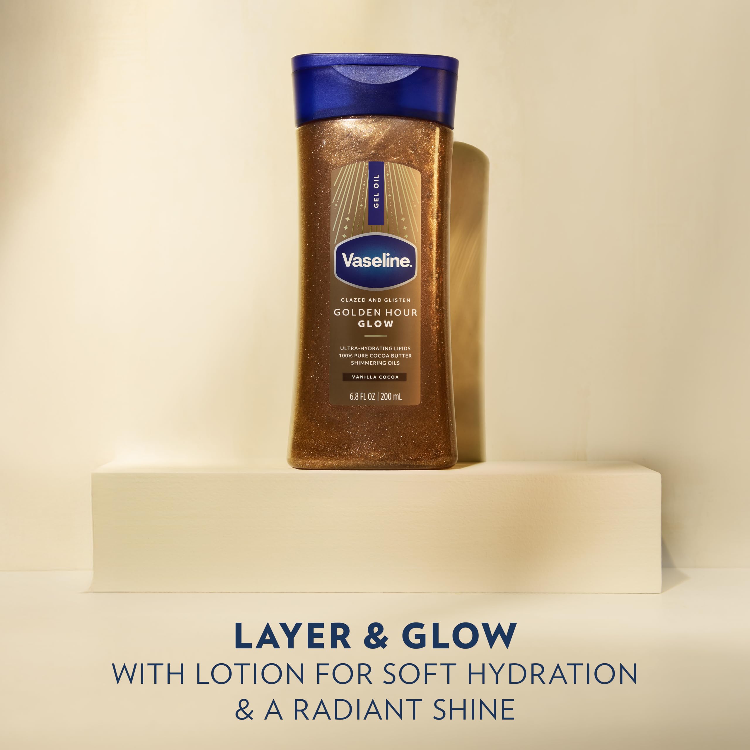 Close up of Vaseline Glazed and Glisten Golden Hour Glow bottle packaging