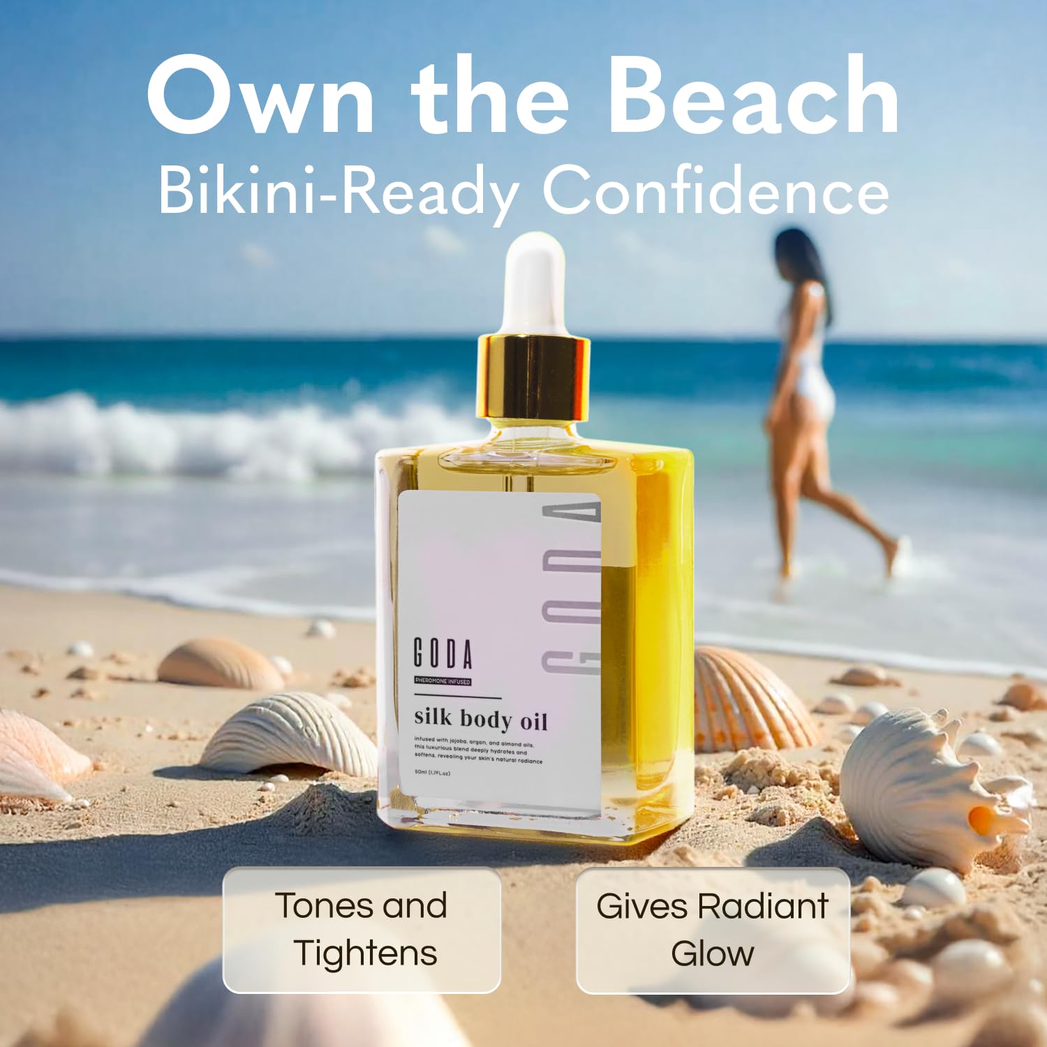 Goda Silk Body Oil 50ml bottle held in hand for scale