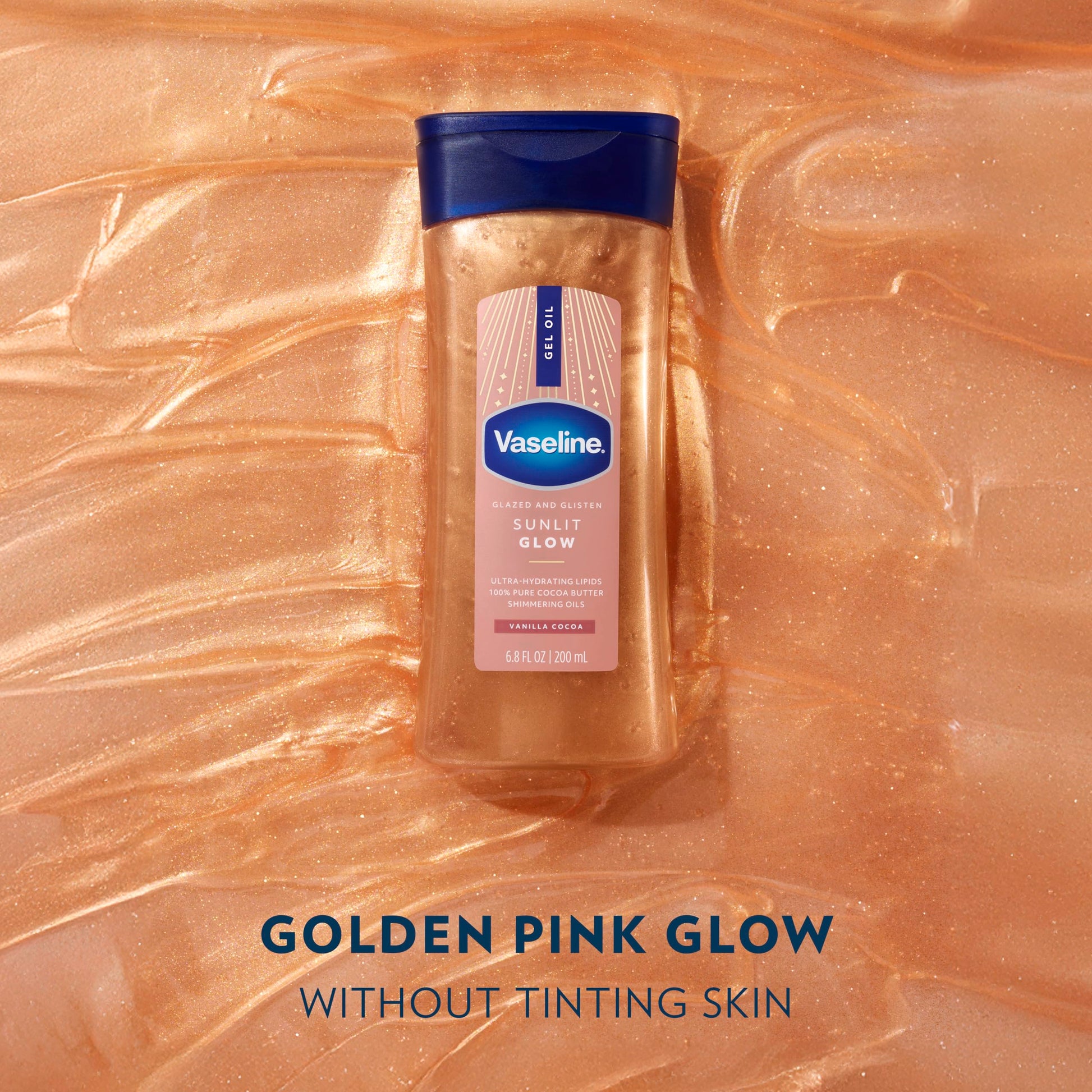 Close up of shimmering texture of Vaseline Sunlit Glow oil