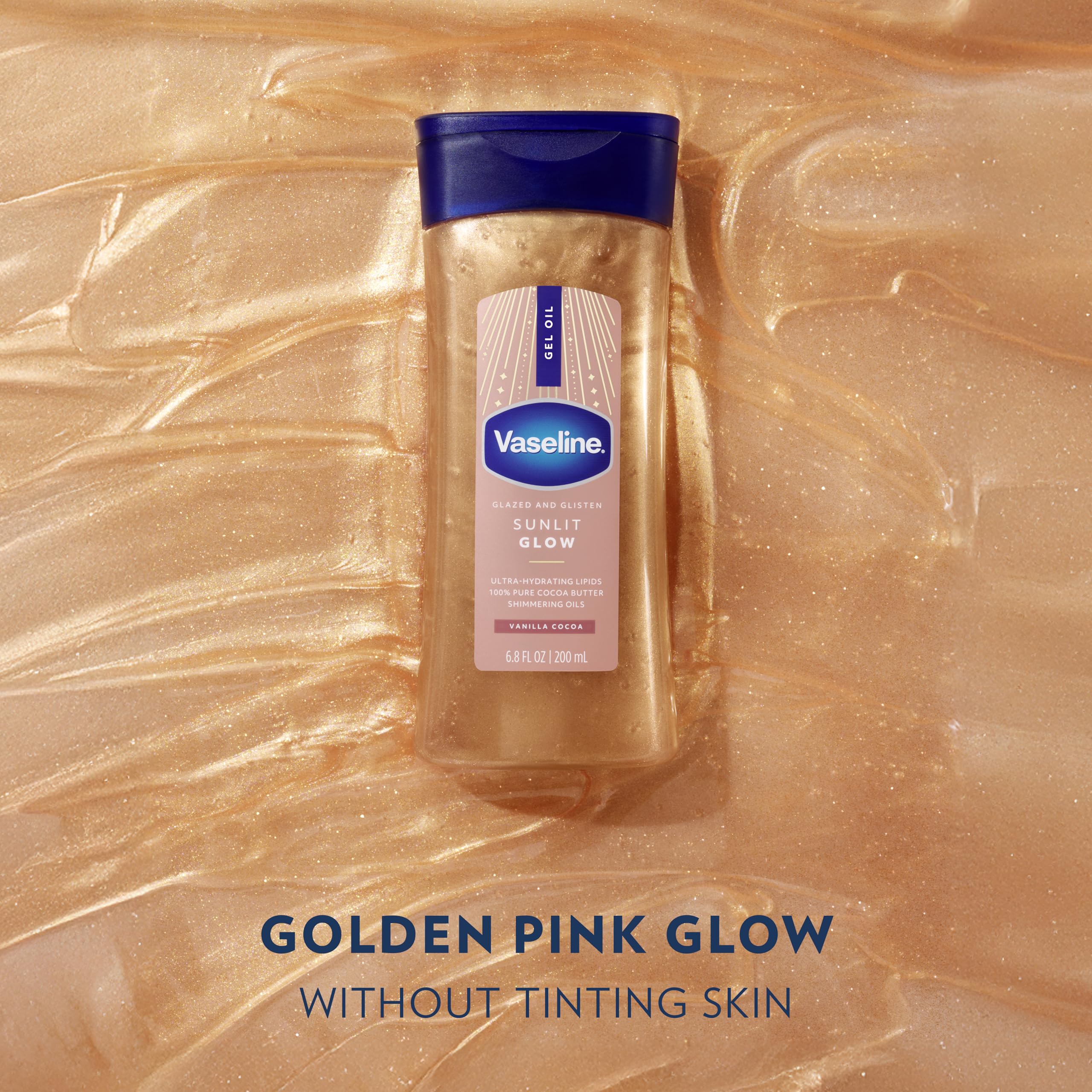 Close up of shimmering texture of Vaseline Sunlit Glow oil