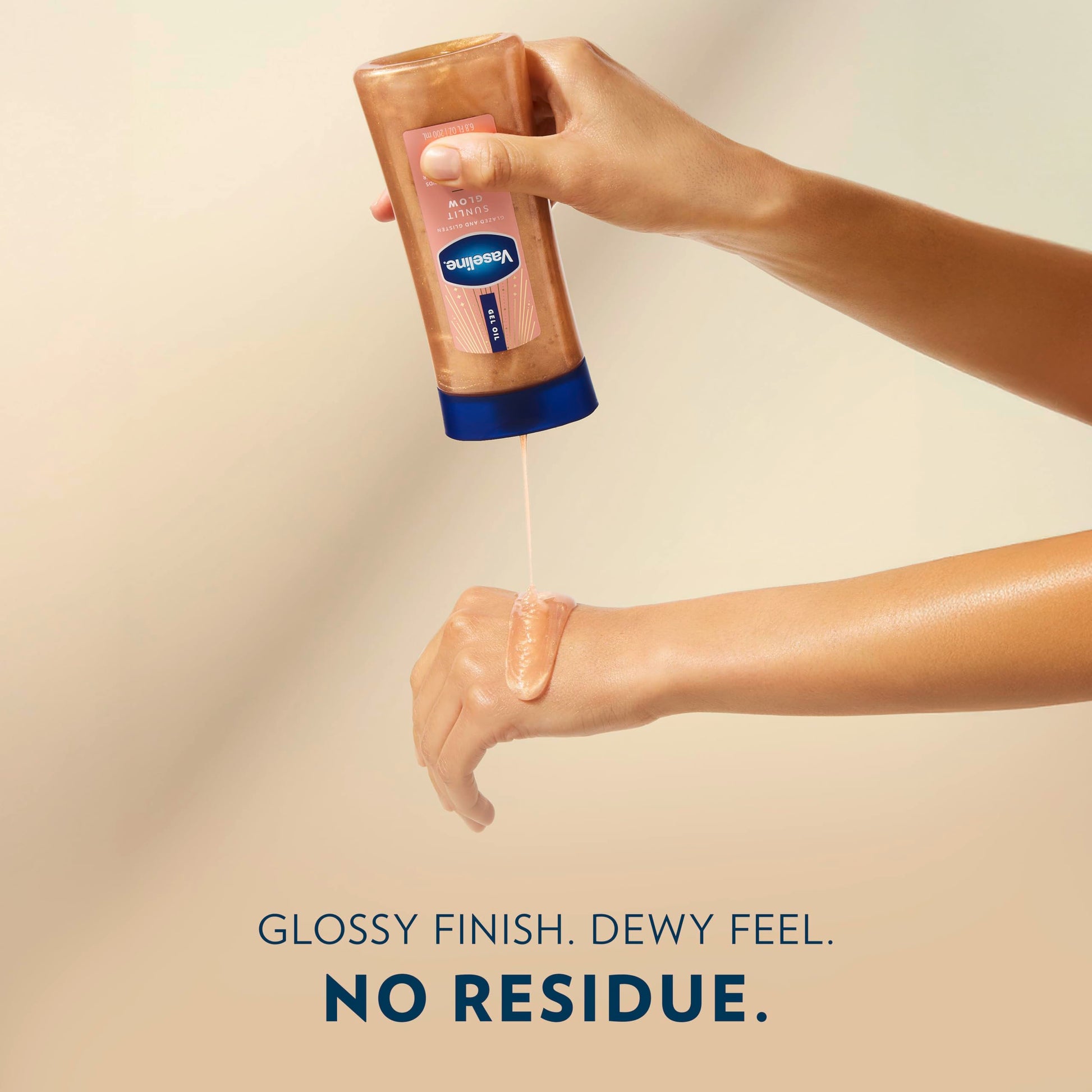 Vaseline Sunlit Glow body oil texture on skin swatch