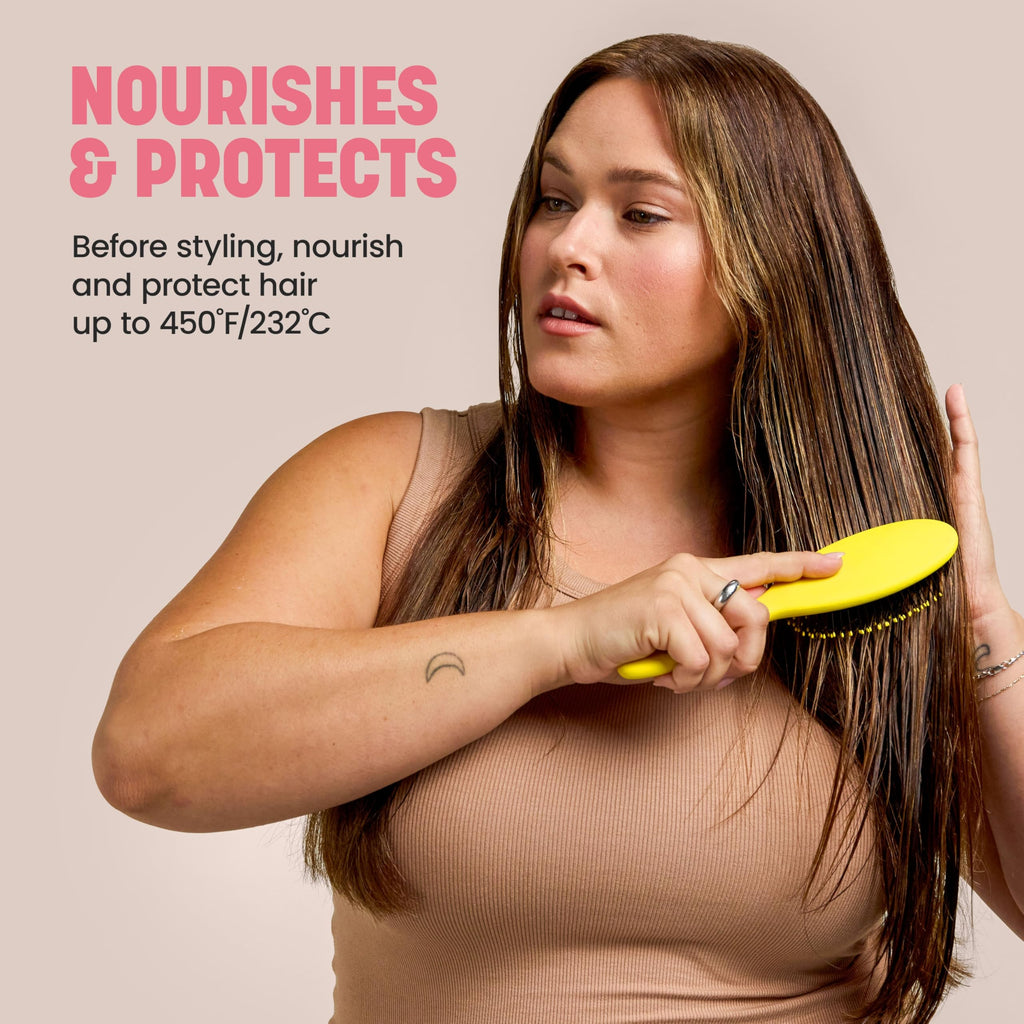 Side angle of the Drybar Prep Rally five fluid ounces bottle highlighting its sleek design.