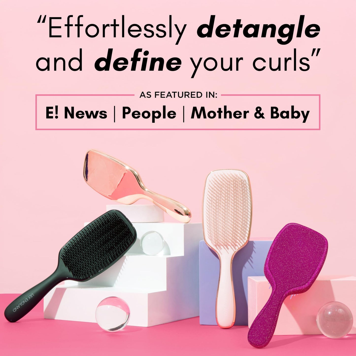 Lily England pink and rose gold curly hair brush ergonomic handle close up.