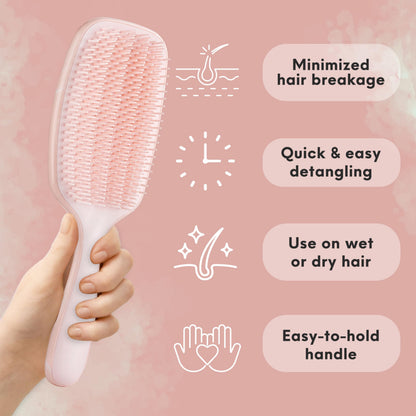 Lily England pain free hairbrush being used on thick wet curly hair.