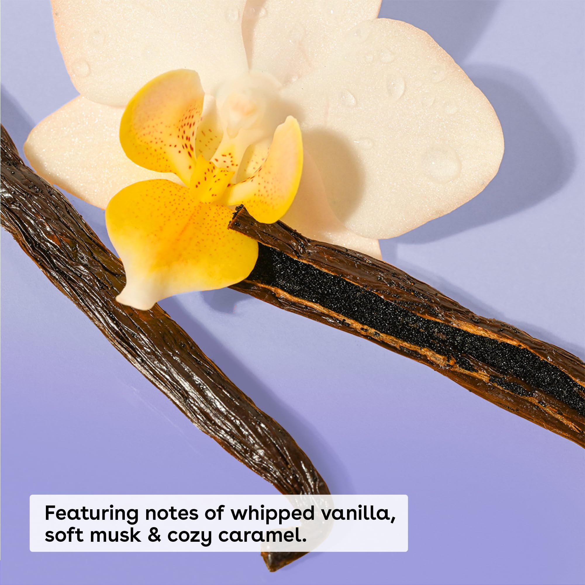 Close up of Eos Vanilla Cashmere Body Oil packaging