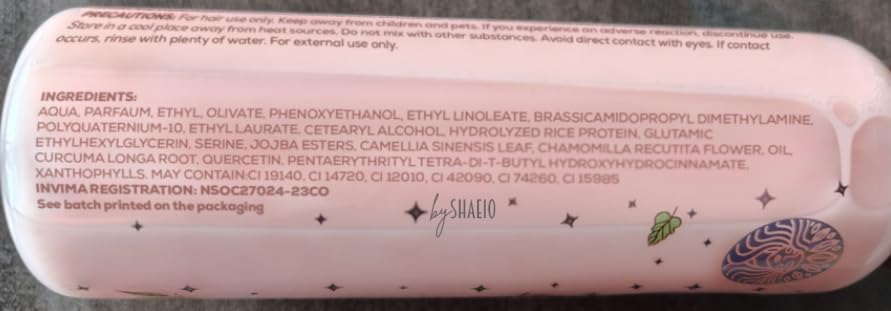Ritual Botanico thermal shield spray held in hand for scale