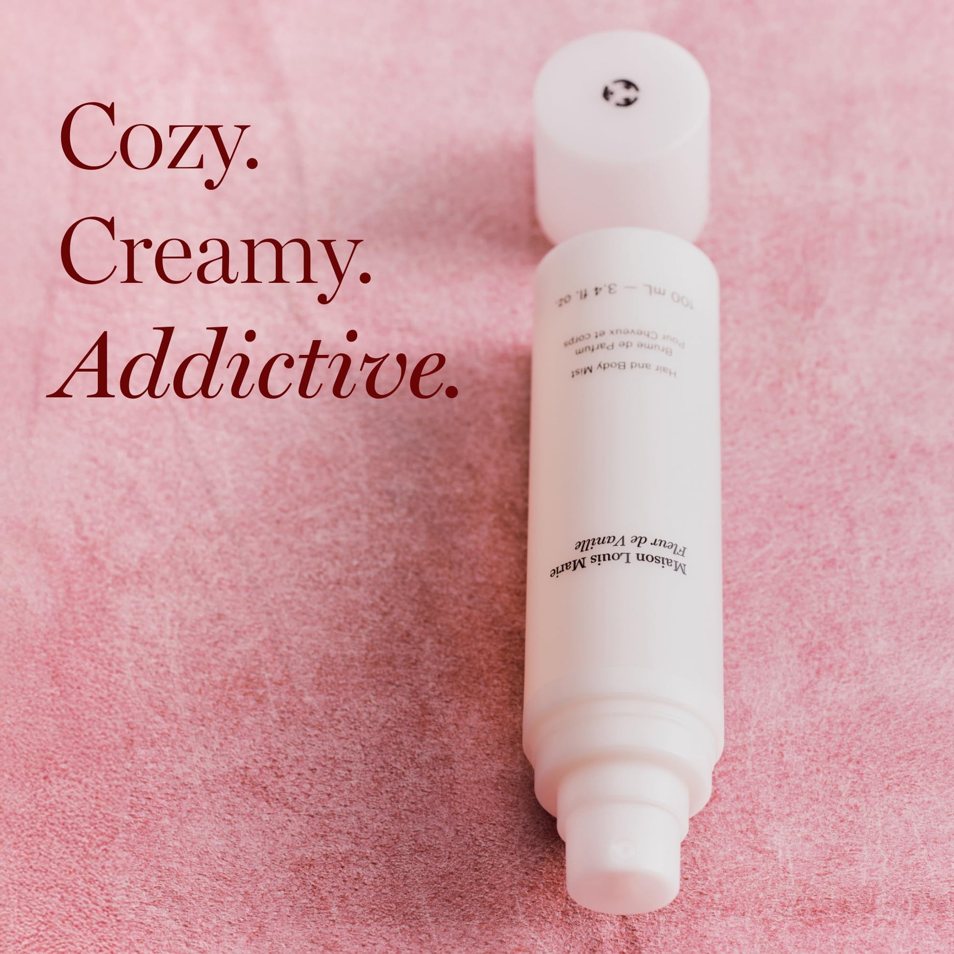 Luxury fragrance mist bottle on a clean background