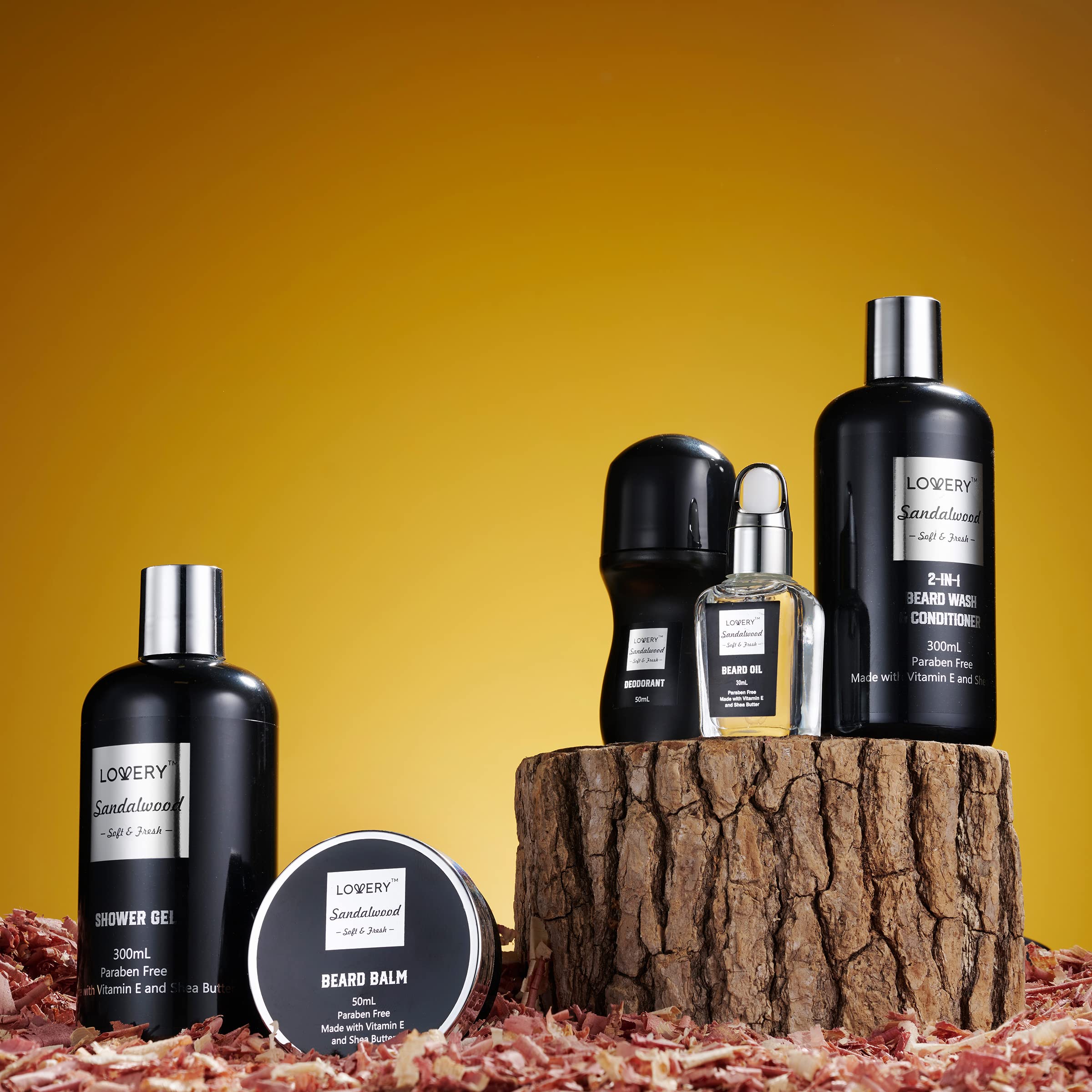 Lovery men grooming accessories highlighting the natural wooden beard brush and exfoliating loofah towel.