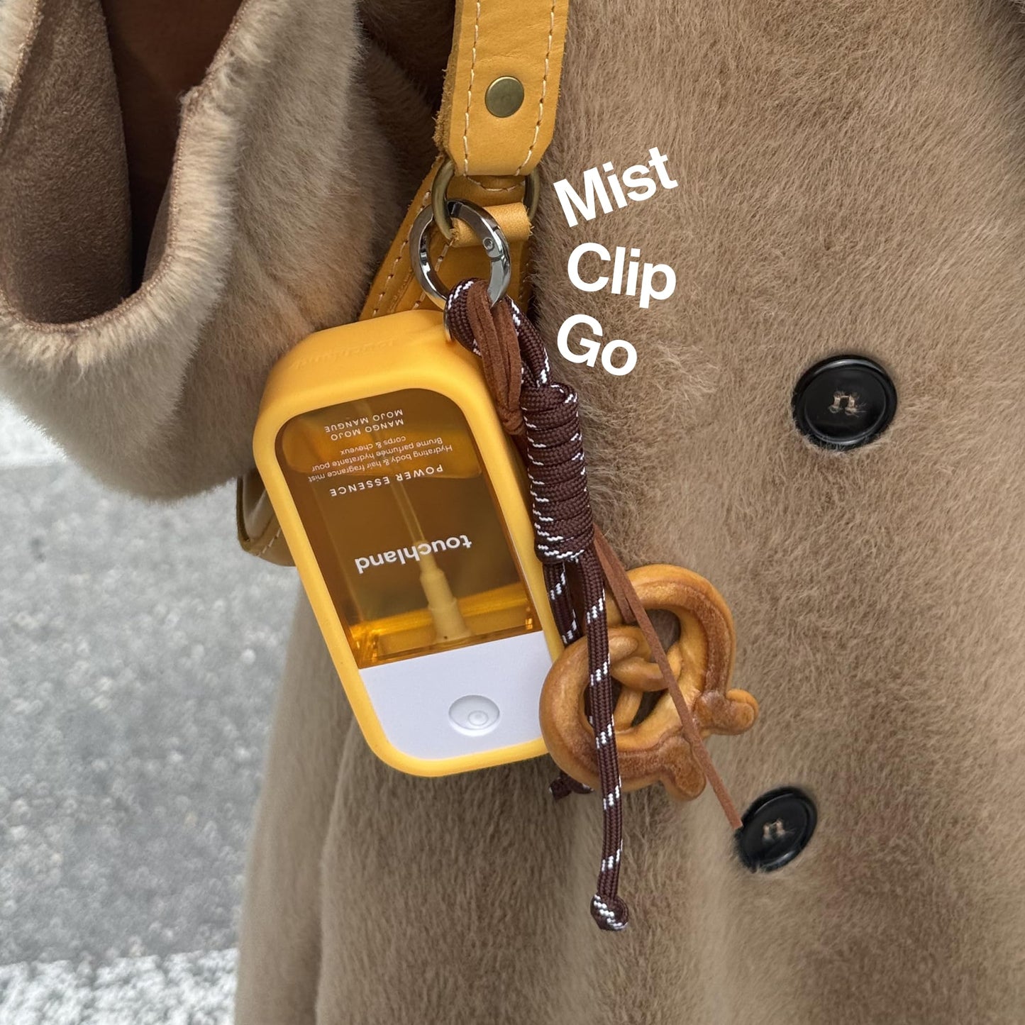 Detail of metal keyring on Touchland silicone fragrance case